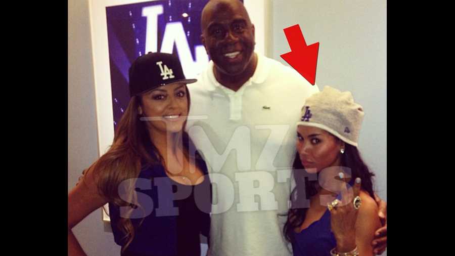 TMZ reported that this Instagram photo of Magic Johnson and V. Stiviano spurred Donald Sterling's racist rant. TMZ added the arrow pointing to Stiviano.