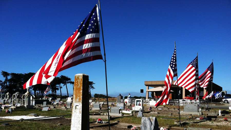 Flags were raised at a cemetery in Moss Landing on Memorial Day. (May 26, 2014)