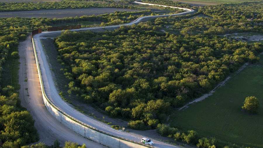 The South Texas McAllen Fenceline in the Rio Grande Valley divides the U.S. from Mexico. 