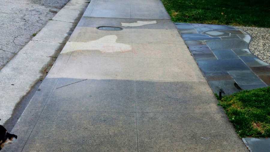 A wet sidewalk is one sign of a water waster. 