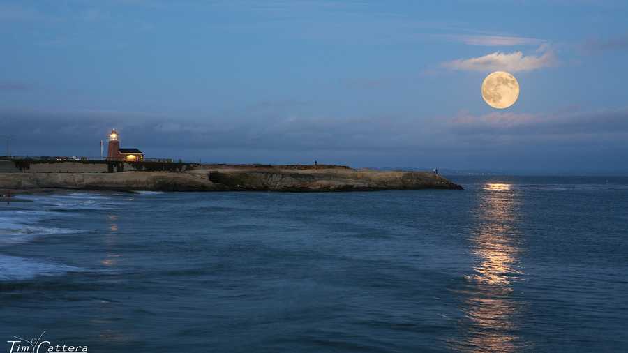 The supermoon is seen on Aug. 10, 2014 by the Santa Cruz lighthouse. 