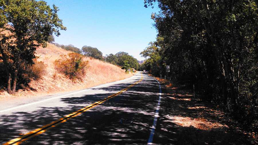 A burned body was found on this road outside Morgan Hill.  (Aug. 28, 2014)