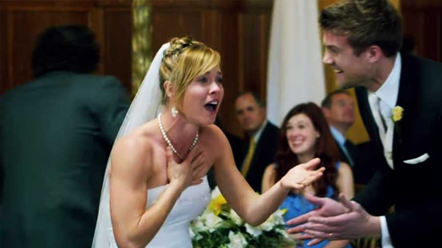 A bride can't believe her eyes when she sees Maroon 5 at her wedding. 