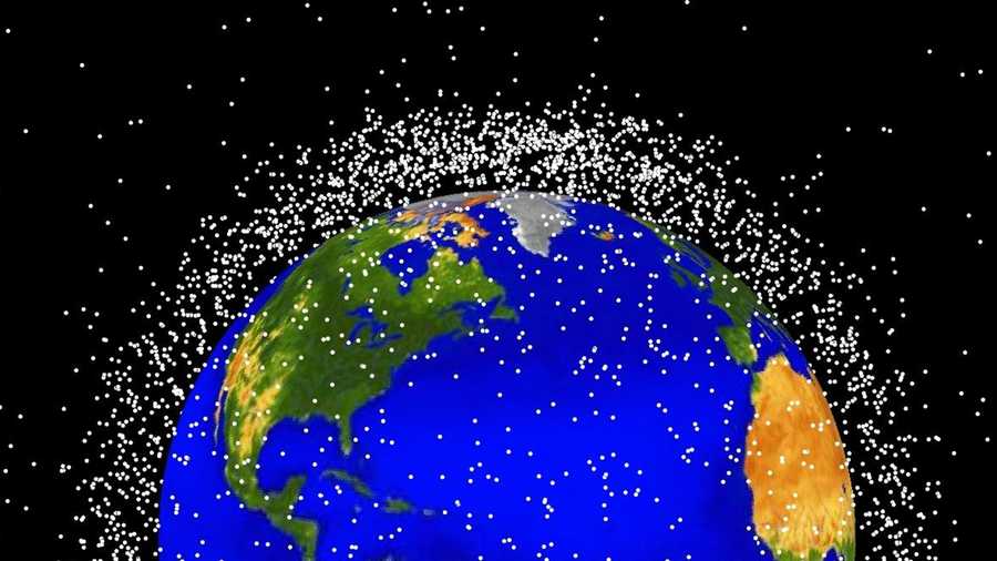 This computer-generated NASA graphic shows objects orbiting Earth orbit that are currently being tracked. Approximately 95 percent of the objects are orbital debris, not functional satellites.