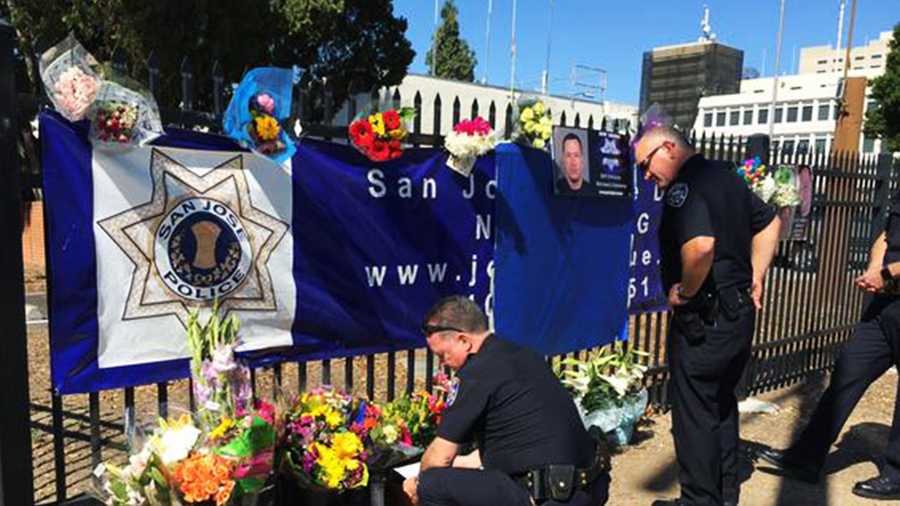 Santa Cruz Police Chief Kevin Vogel and two deputy chiefs paid their respects to fallen 14-year veteran San Jose police Officer Michael Johnson. (March 26, 2015)