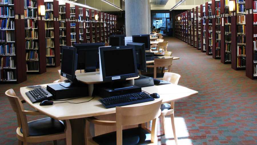 file - generic photo of a library with computers.