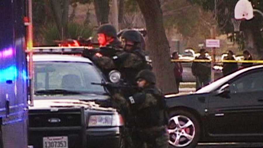 A Salinas police SWAT team arrested three armed bank robbery suspects near Hartnell College on Tuesday. (Feb. 14, 2012)