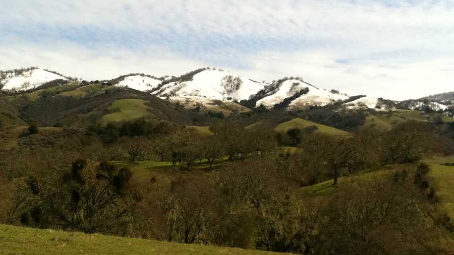 Mountains above Carmel Valley are dusted with snow. (March 19, 2012)