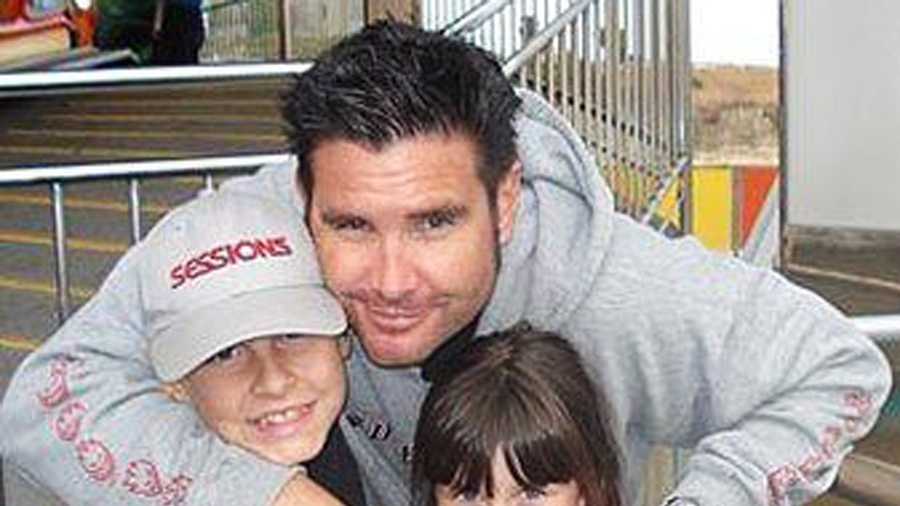 Bryan Stow is seen with his two kids before the 2011 Dodger Stadium attack. 