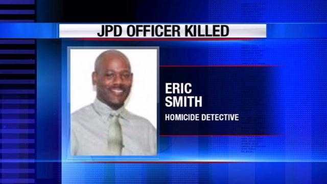Decorated homicide Detective Eric Smith was gunned down inside an interview room late Thursday afternoon as he was questioning 23-year-old murder suspect Jeremy Powell about a killing days earlier.