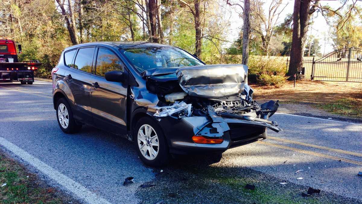SUV collides with school bus