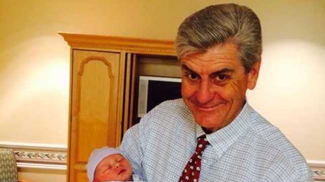 Gov. Phil Bryant holds his first grandchild, Henry Stephen Snell.
