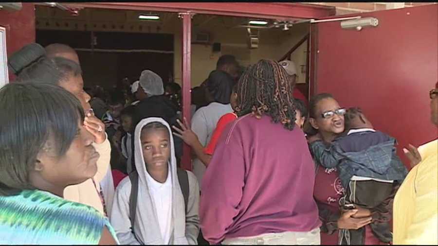 No. 11: An enormous crowd of parents pick up their children at Hazlehurst Middle School after learning the principal had returned from Zambia. Click here for video.