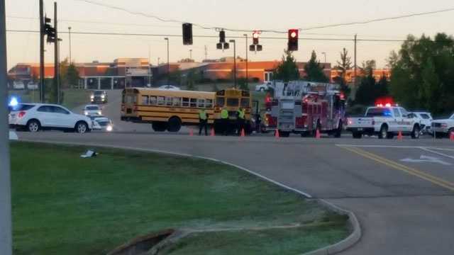 Driver injured in crash involving school bus