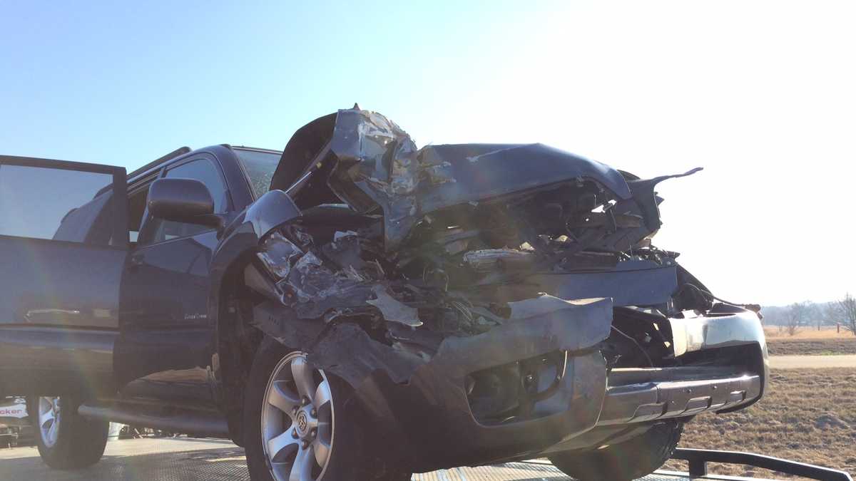 SUV collides with school bus