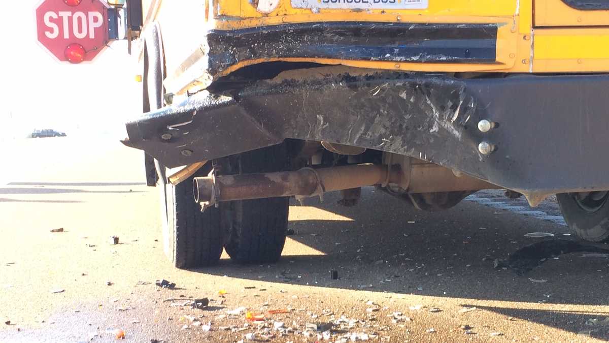 SUV collides with school bus
