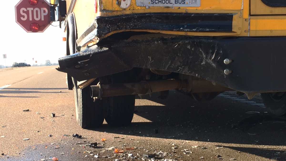 SUV collides with school bus