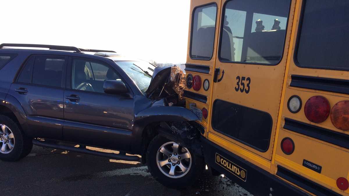 SUV collides with school bus