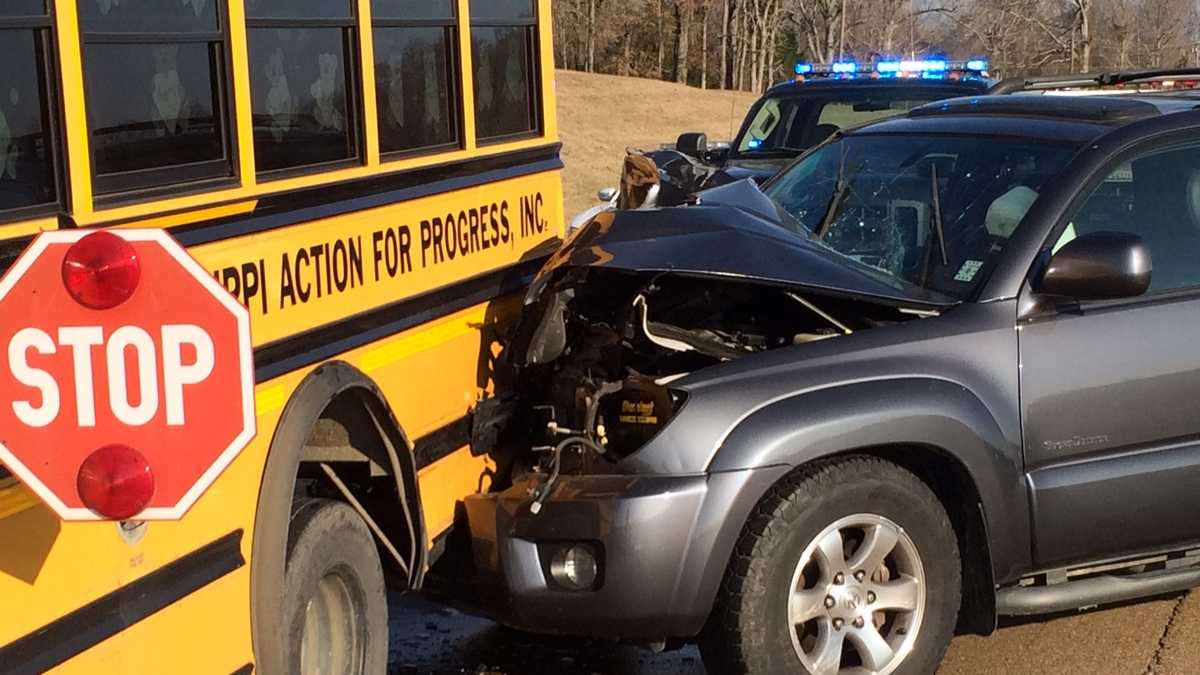 SUV collides with school bus