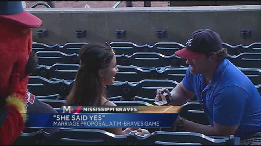 Caught on Camera: a man proposes to his girlfriend at an M-Braves game at Trustmark Park.