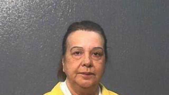 Shirley Atkinson, 52, is charged with eight counts of felony embezzlement, Gautier police say.