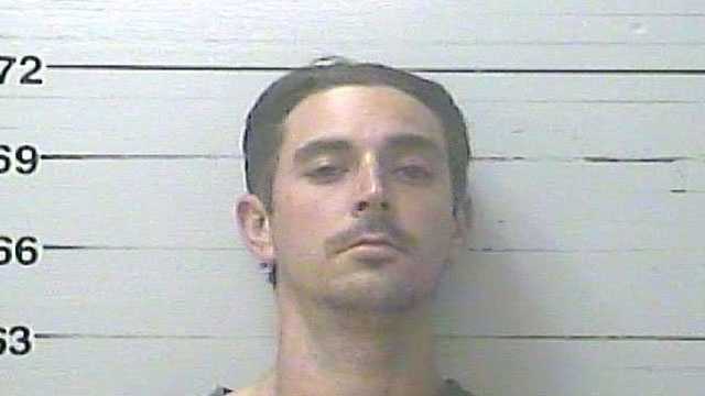 Casey Alden Louviere, 30, is charged with aggravated assault, the Harrison County Sheriff's Department says.
