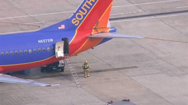 In photos: Flight attendant falls ill aboard flight to BWI