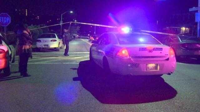 Baltimore police are looking for whoever shot and killed two men and critically injured their mother Tuesday night.