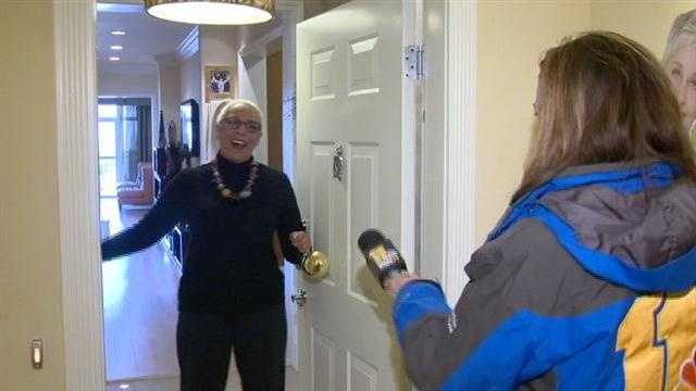 Baltimore resident Trena Brown is surprised by 11 News reporter Jennifer Franciotti with news that she's 1 of 10 grand prize winners who will get to go to one of the Ellen Show's 12 Days of Giveaways tapings. 