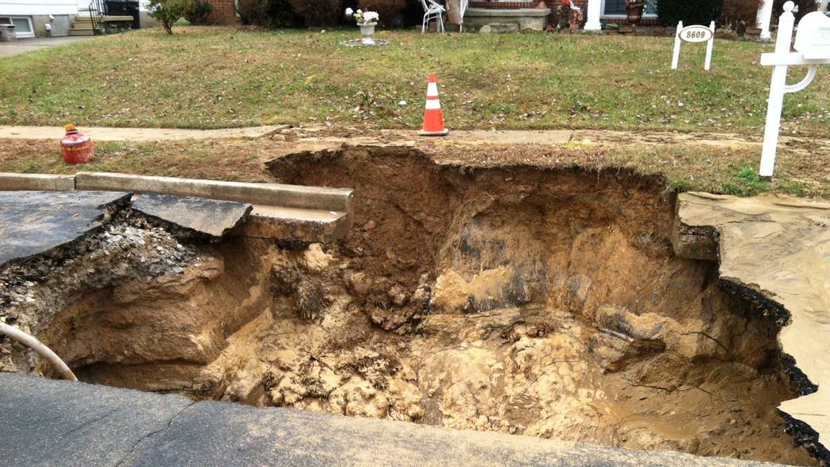 Images: Randallstown water main break creates sinkhole