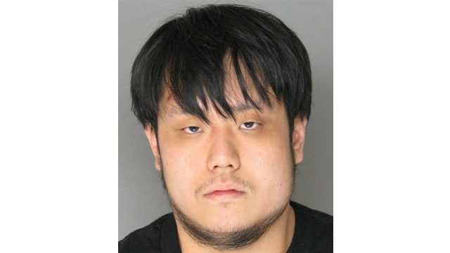 Police said 26-year-old Francis Minsung Kang faces several charges in connection to a shooting in Towson that injured one man.