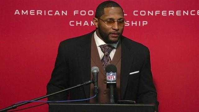 Baltimore Ravens' Ray Lewis, left, and Ray Rice talk during a team