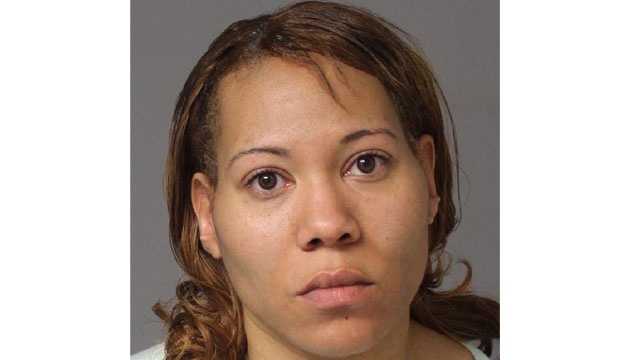 Police said Donna Mills Wood, 38, of Odenton, who was wanted in connection with her husband's death, turned herself in.