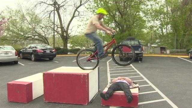 Matt Gilman practices his trick biking moves. 