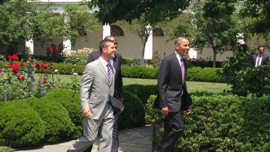 Baltimore Ravens General Manager Ozzie Newsome and Baltimore Ravens Head Coach John Harbaugh join President Barack Obama at the White House.