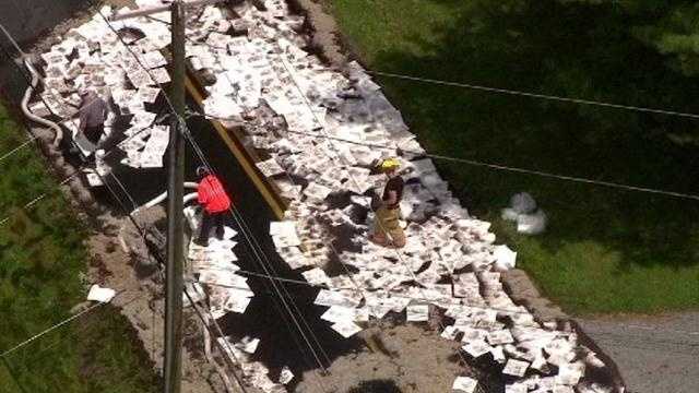 Photos: Tanker overturns, spills fuel on county road
