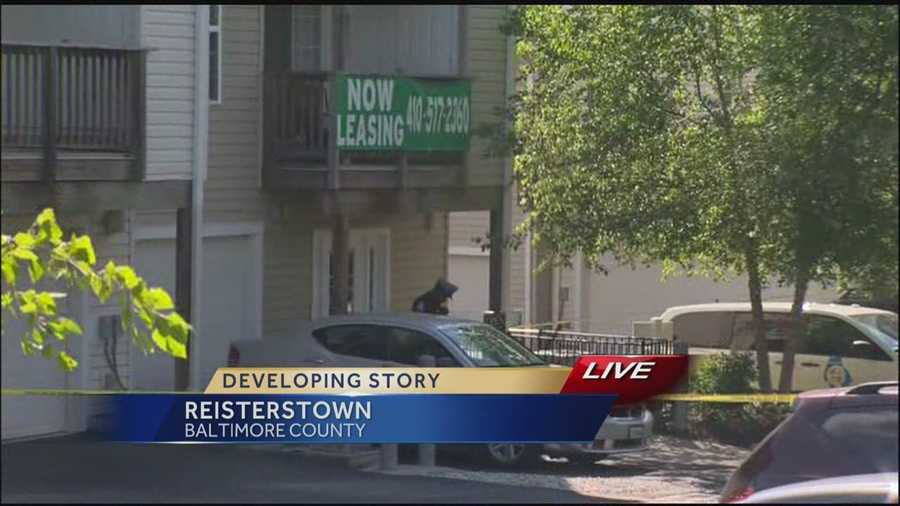 Baltimore County police detectives say a woman was found dead in leasing office of townhome community.