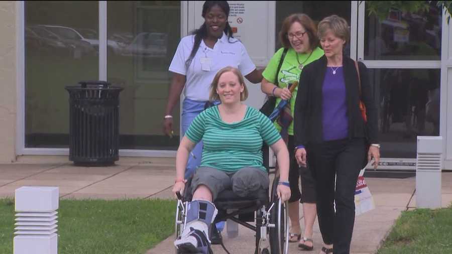 The Towson teacher injured in the Boston Marathon explosions returns home for the first time since the bombings.