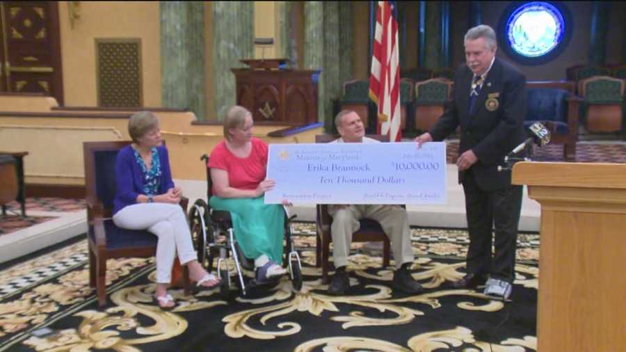 In Cockeysville on Wednesday, the Freemasons of Maryland Grand Lodge presented Boston bombing victim Erika Brannock with a $10,000 check.
