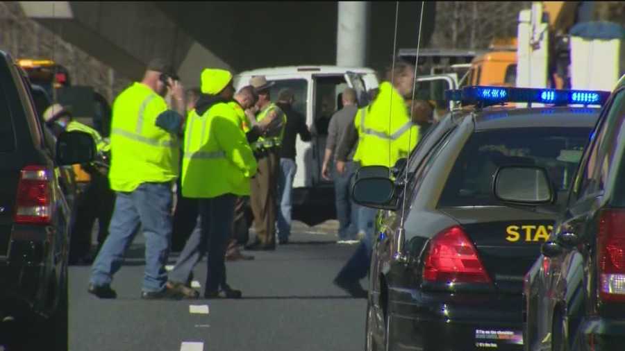 One State Highway Administration worker was killed and a second was injured when a car smashed into them while they were working on a roadway sign on the Beltway, Maryland State Police said. The driver of the car was also injured.