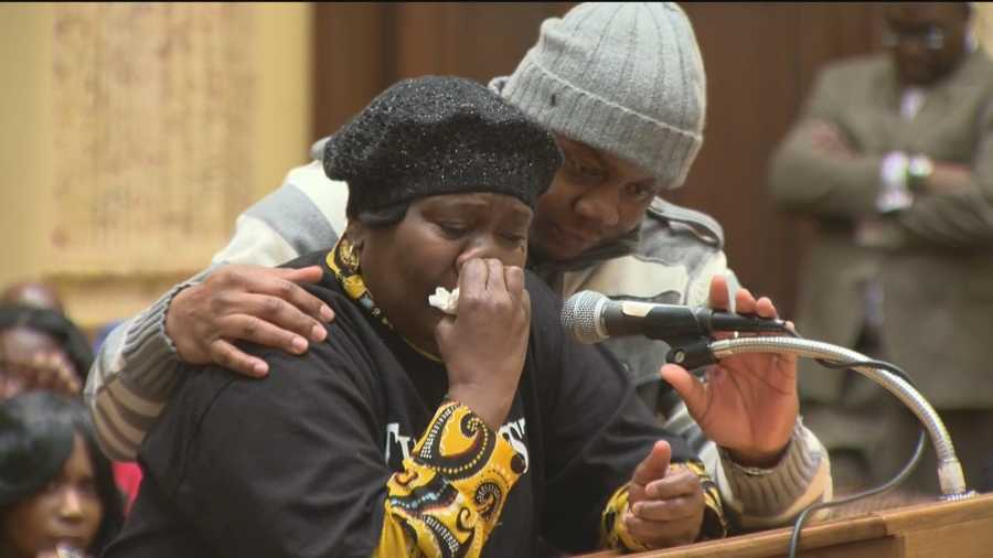 Tyrone West's mother sobs during a City Council hearing into his death. 