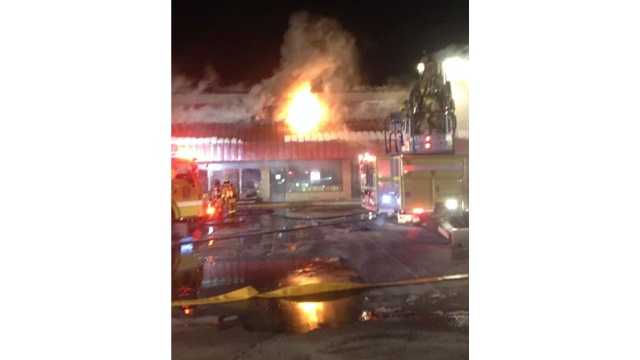 Firefighters battle a blaze at an Eldersburg strip mall