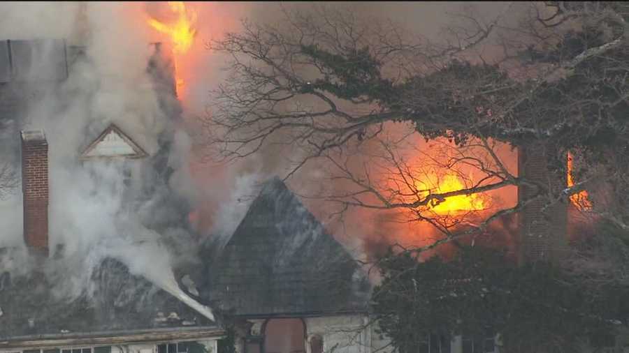 A three-alarm fire spread quickly through a 159-year-old mansion in Baltimore's Roland Park neighborhood Thursday afternoon, destroying the Civil War-era home. 