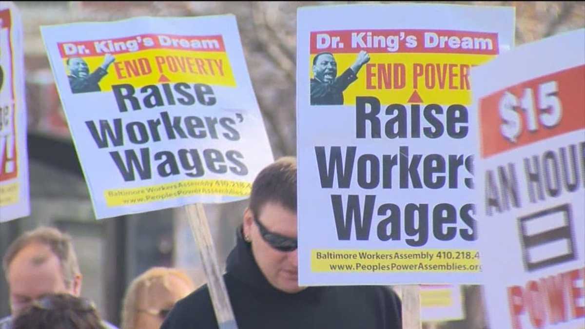Officials, workers rally for minimum wage hike