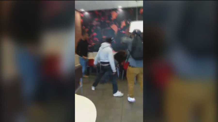 A brawl caught on video at a downtown Baltimore McDonald's restaurant may have been sparked by a prank called "slap cam" that's making the rounds online.