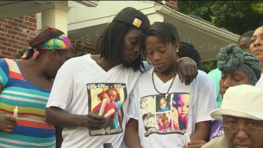 Family, friends and neighbors of McKenzie Elliott gathered Wednesday in Baltimore's Waverly section to mourn the 3-year-old who was killed by a stray bullet last week.