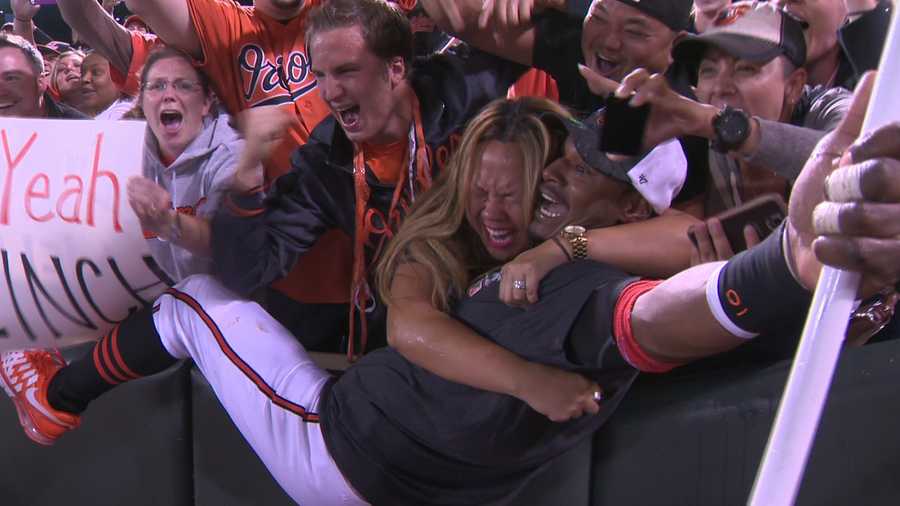 Adam Jones jubilant with fans after the O's clinch the playoffs.