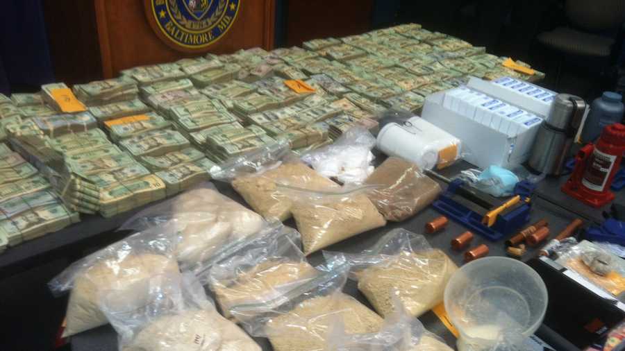 Baltimore City police say they seized 12 kilograms of heroin and $825,000 in a huge drug bust.