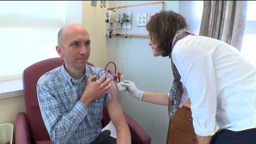 A couple dozen people across Baltimore are playing a key role in the world's effort to end the Ebola outbreak by testing an experimental vaccine that experts are pretty excited about.
