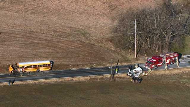 SUV driver dies in crash with school bus